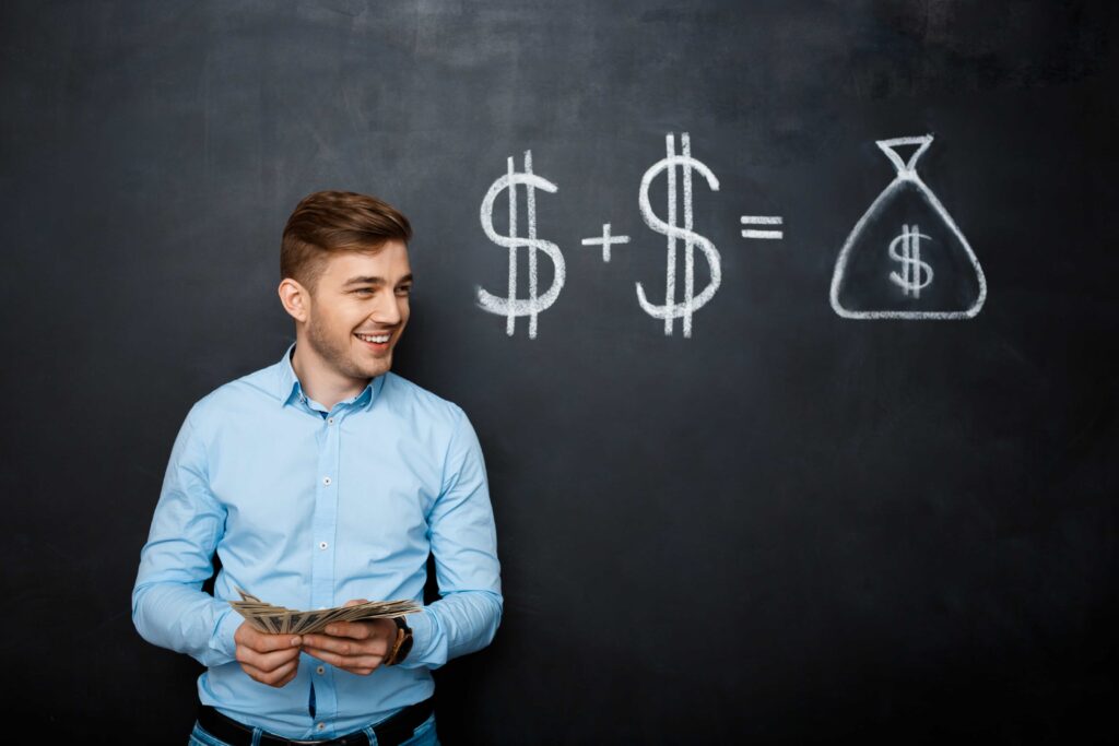 Man standing in front of blackboard with drawn dollar concept